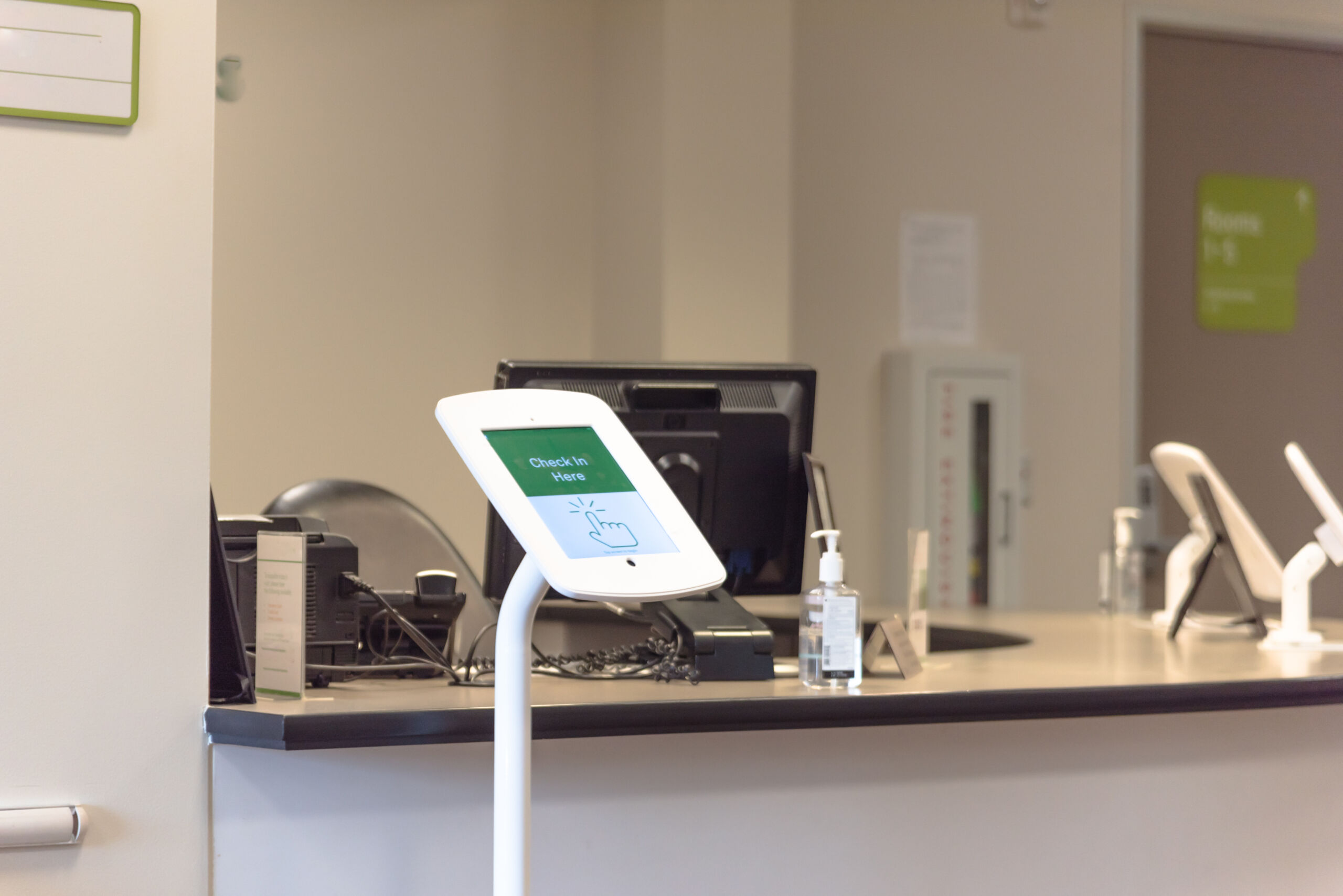 Interactive Hologram Used For Patient Check-In At Front Desk Of Test Center For Diagnostic Testing.